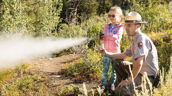 Ranger Sammy uses bear spray