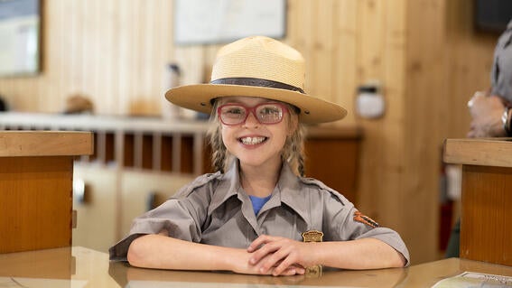 Ranger Sammy behind the desk