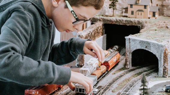 Honour playing with train