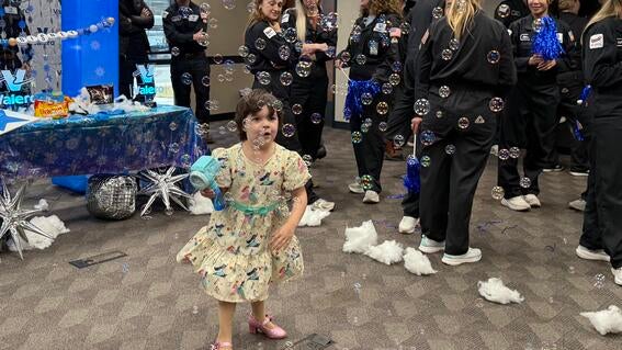 girl with a bubble wand