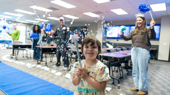 Girl playing with a wand