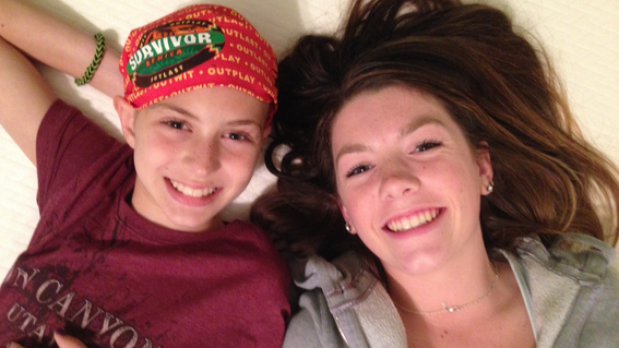 Isabella with her sister by her side during treatment.