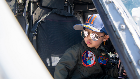 Ringo in a helicopter on his wish trip to a military base.