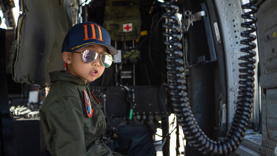 Ringo in a helicopter on his wish trip to a military base.