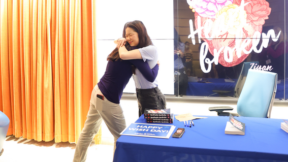 Ziyan hugs a member of her medical care team at Lucile Packard.
