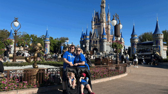 Lucas and family in front of castle