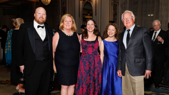 Marti Pozzi and Jim Congdon with guests at Evening of Wishes: A World of Wishes