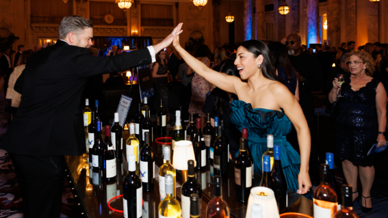 Wine Toss at Evening of Wishes: A World of Wishes Cloud Nine Afterparty