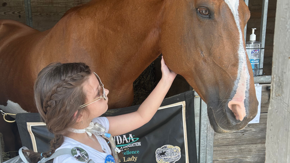 Ella with a Breyer horse