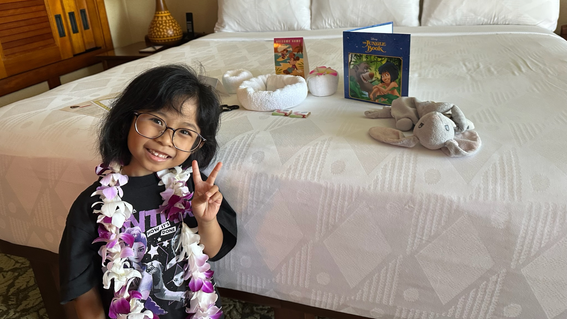 Bella sporting a Hawaiian lei during her wish trip to Aulani, A Disney Resort & Spa