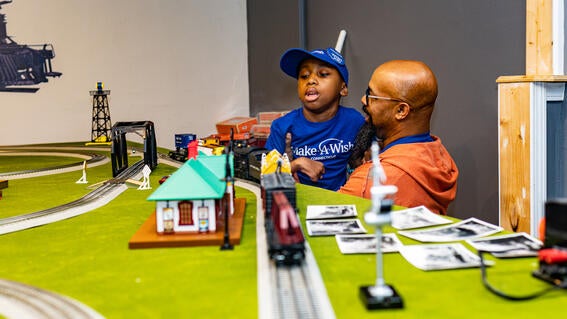 Jackson and Dad in Train Room