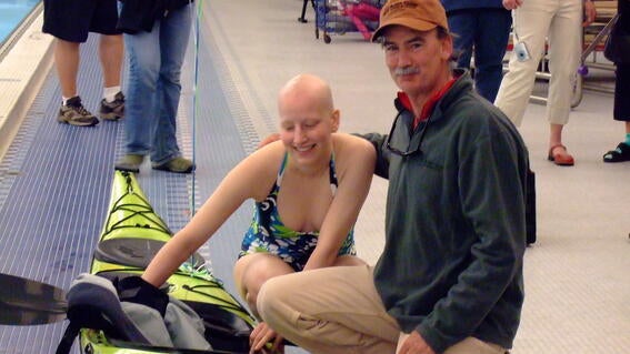 Lenka getting in the Kayak