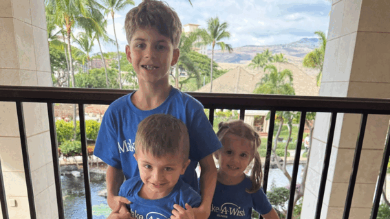 Max and his siblings on a porch