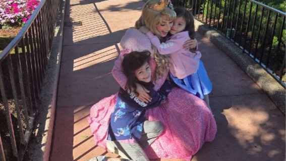 Syanna meeting a princess at Disney