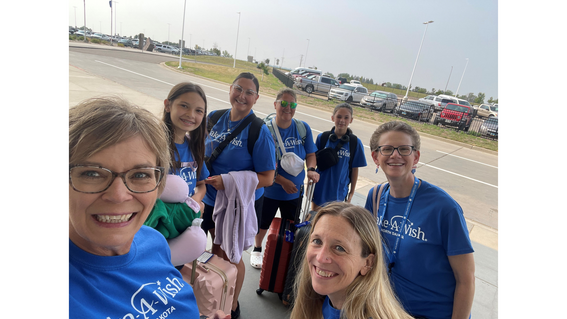 Tara at the airport with the Decoteau family