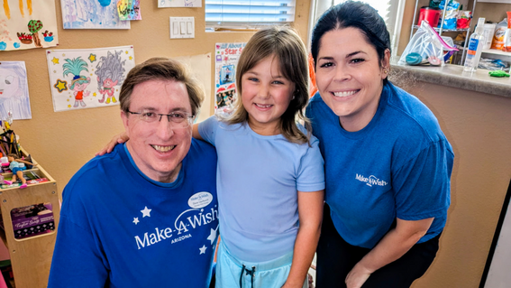 Dave Upchurch, May Volunteer of the Month, and Taylor Loomis with Wish Kid