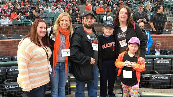 wish kid Ben and family on the field before a Giant's game