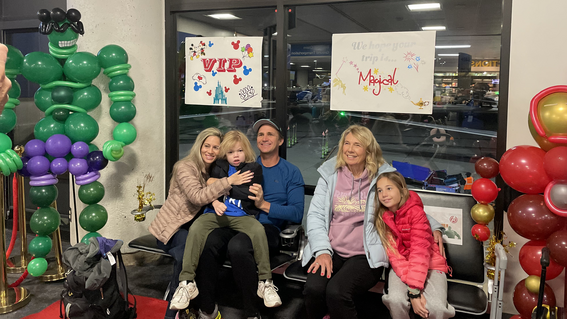 Wish Kid Caelum at the airport on his way to his wish to go to Walt Disney World Resort with his family.