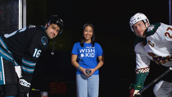 Jackie Nguyen doing puck drop at Tucson Roadrunners Make-A-Wish AZ Alumni Night