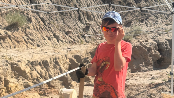 Ian posing at the dino dig site