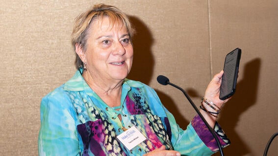 Wish mom and wish-granting volunteer Tascha Whetzel accepts this year’s Wish It Forward Full Circle Award.  