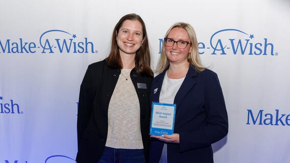 Make-A-Wish staff member Amy Lynch on the left with Top Golf San Jose's Lead Office Manager Bex Klatt on the right.