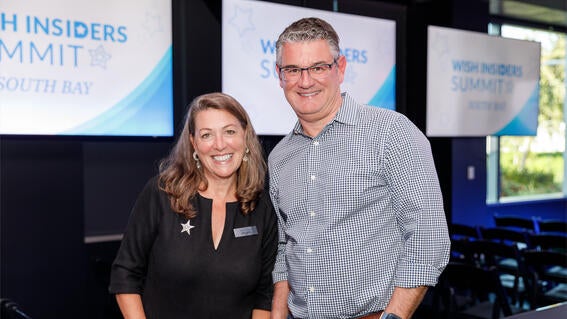 Make-A-Wish Greater Bay Area CEO Betsy Biern with a guest at Wish Insiders South Bay