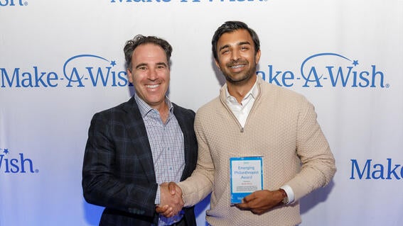 Make-A-Wish Greater Bay Area staff member Dennis Schrag on the left with Emerging Philanthropist award winner Rishi Dixit on the right
