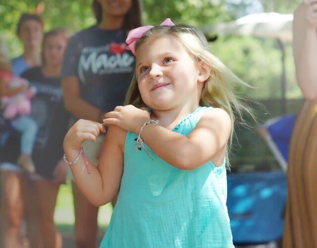 Macie excited for her treehouse wish