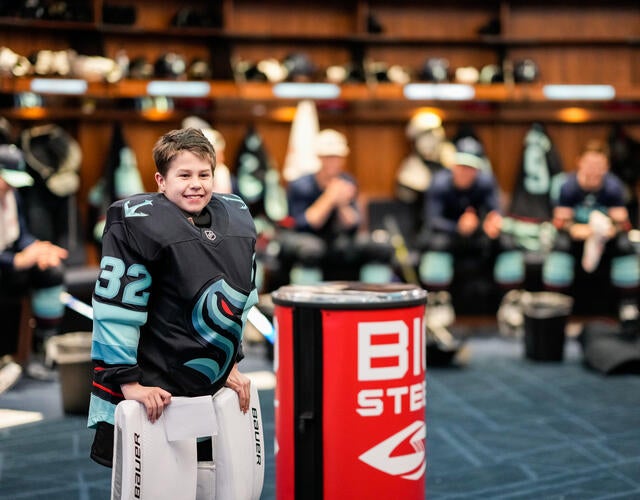 Jackson in the locker room with Kraken players