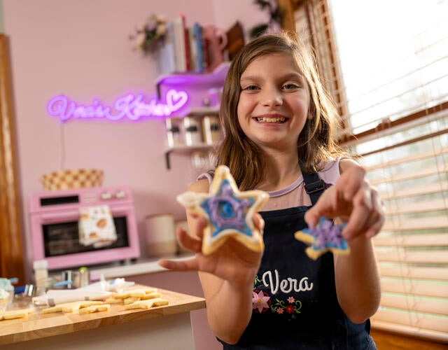 Wish kid Vera in her new baking kitchen