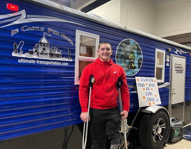 Wish kid Dawson with his fish house