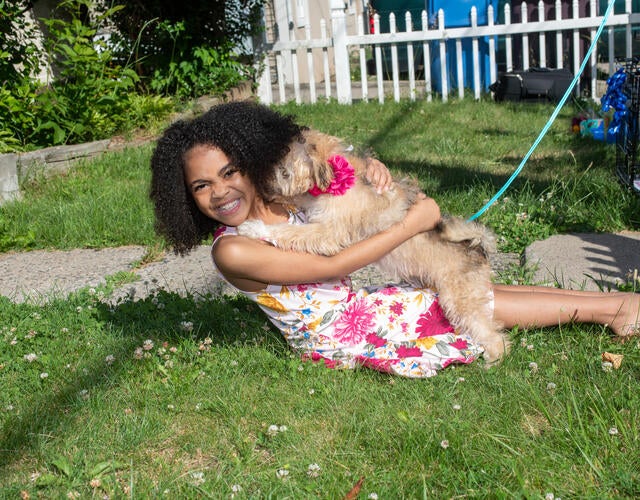 Wish kid Nyla with her new puppy