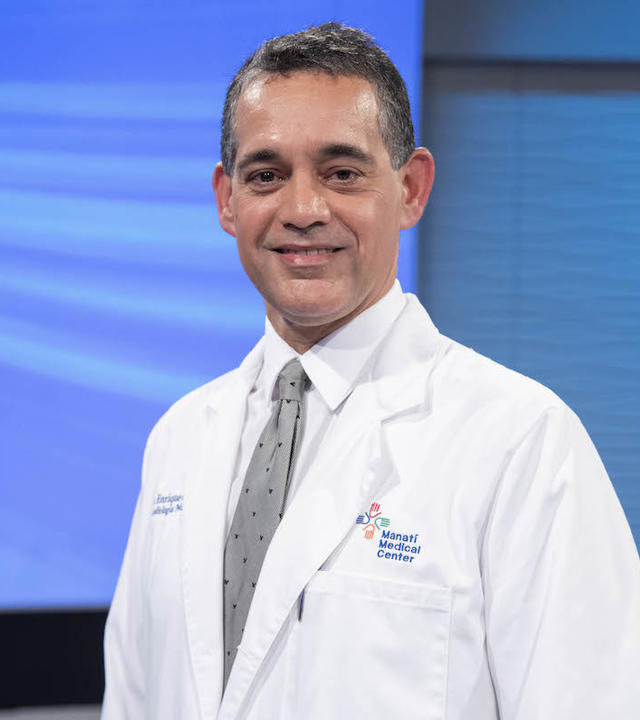 Dr. Enrique Carrion