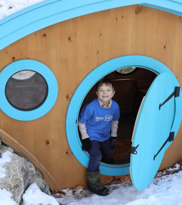 Drew in the doorway of his Hobbit Hole 