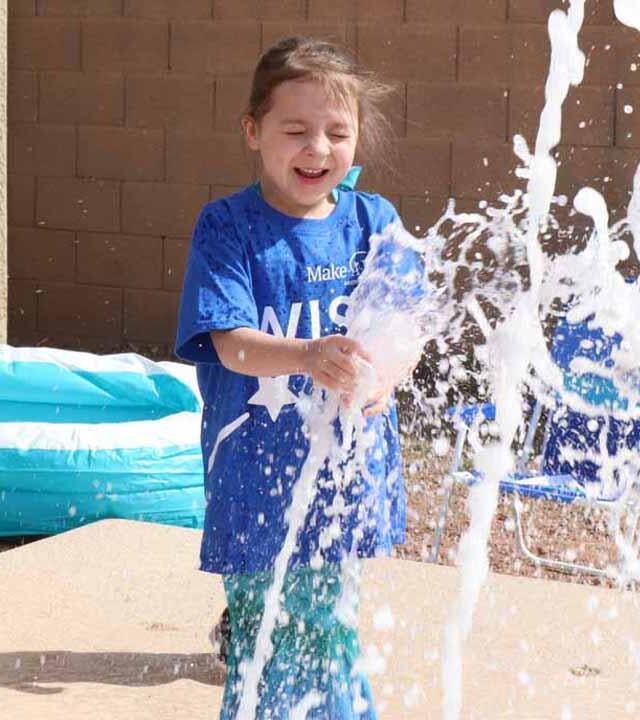 Arya wished for a splash pad to cool down in the Arizona heat!
