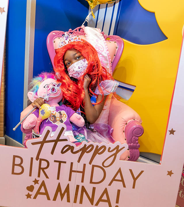 Amina with birthday banner