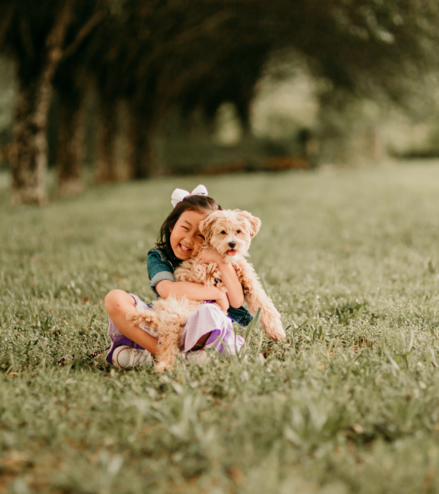 Maelin-Kate holds her wish puppy, Penny