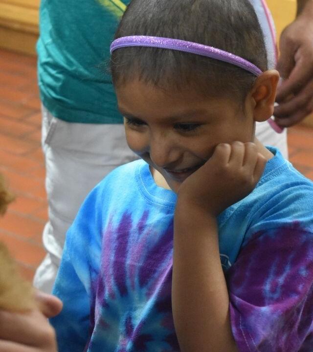 Wish kid Polet smiling 