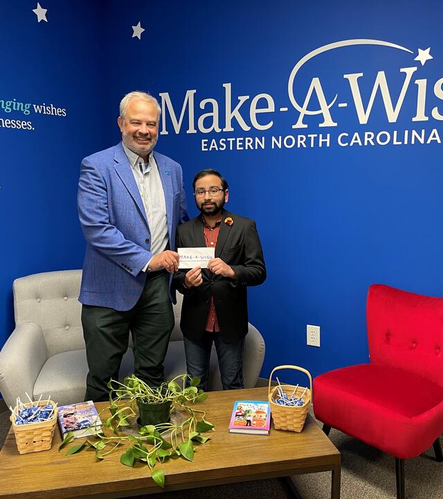 Wish kid Neel with Make-A-Wish President Chris Winter