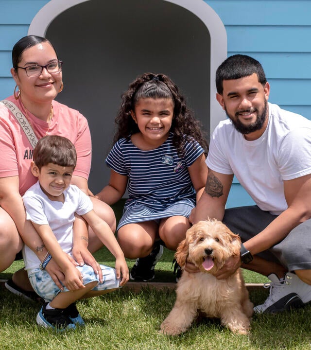 Jaxson and family with new goldendoodle puppy