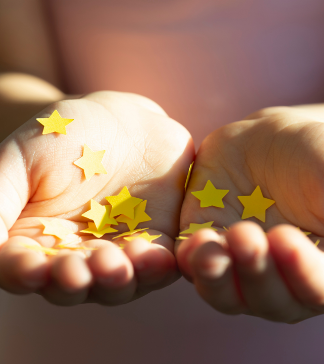 Hands with stars