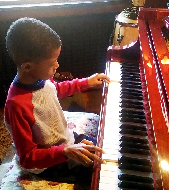 Wish Kid Kai at piano
