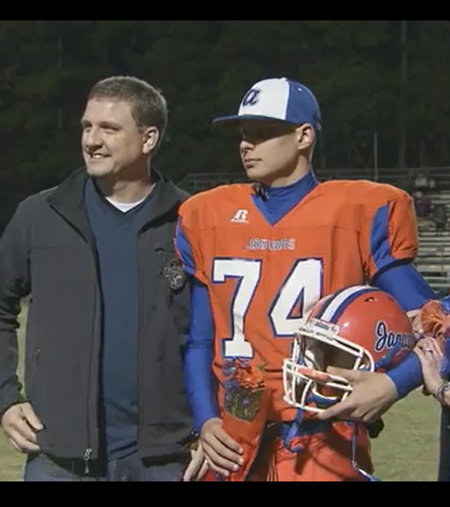Wish Alumni Coby in high school with his parents