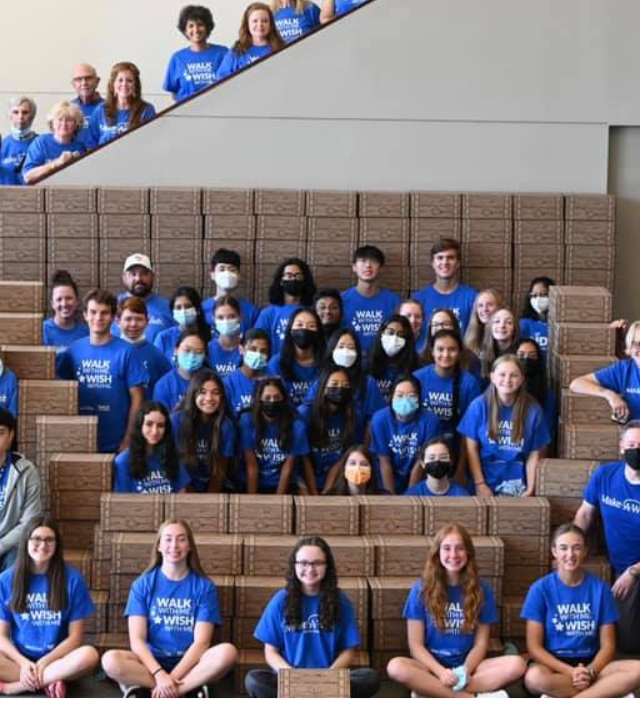Jordan and volunteers with treasure boxes