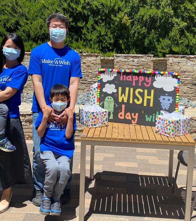 Wish kid Willie with his parents and brother on his wish day