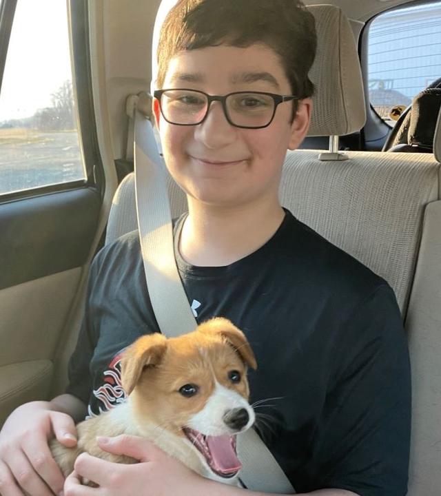 Nicholas with his new puppy