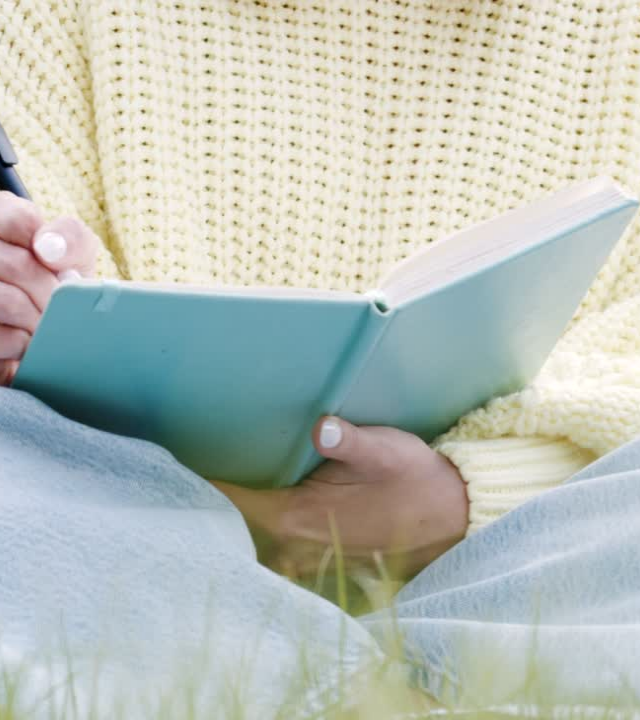 Girl writing in journal
