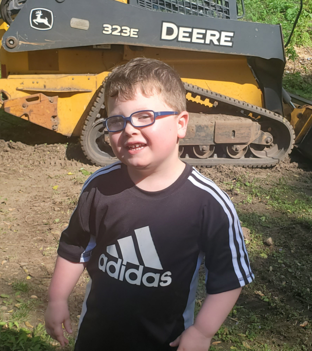 Greyson in his backyard 