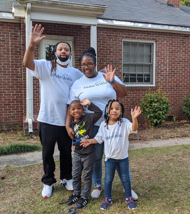 Wish kid Emoni and her family after a fun day of shopping